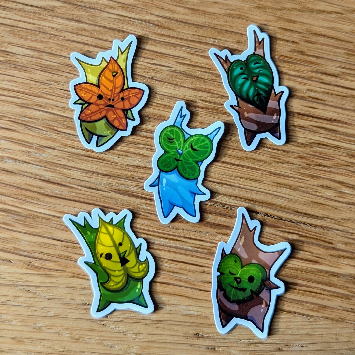 Small stickers of spirit of the forest wearing leaf masks. Inspired by the games of Legend Of Zelda Breath Of The Wild and Tears of the Kingdom.